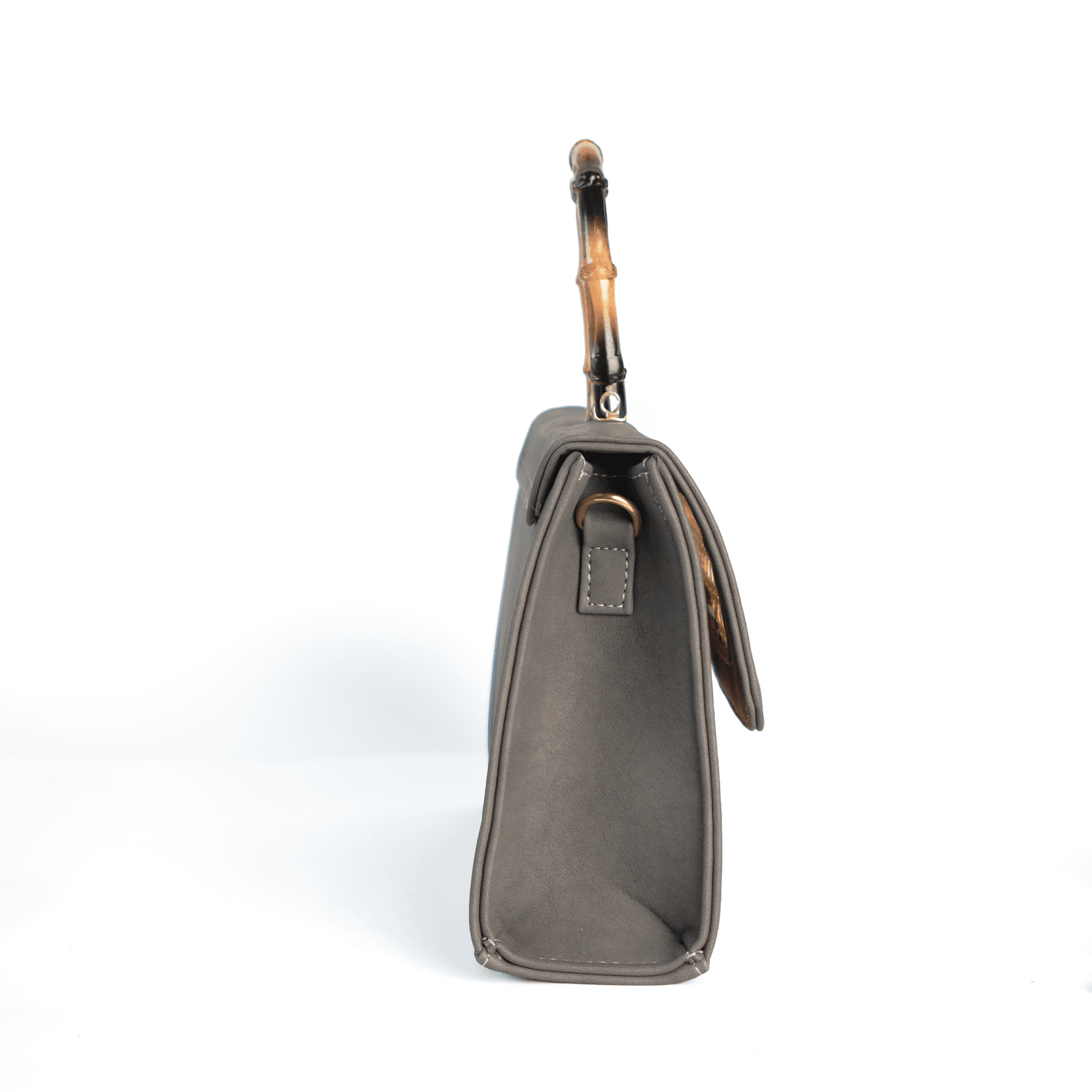Grey Taaq bag side profile showing depth and strap ring