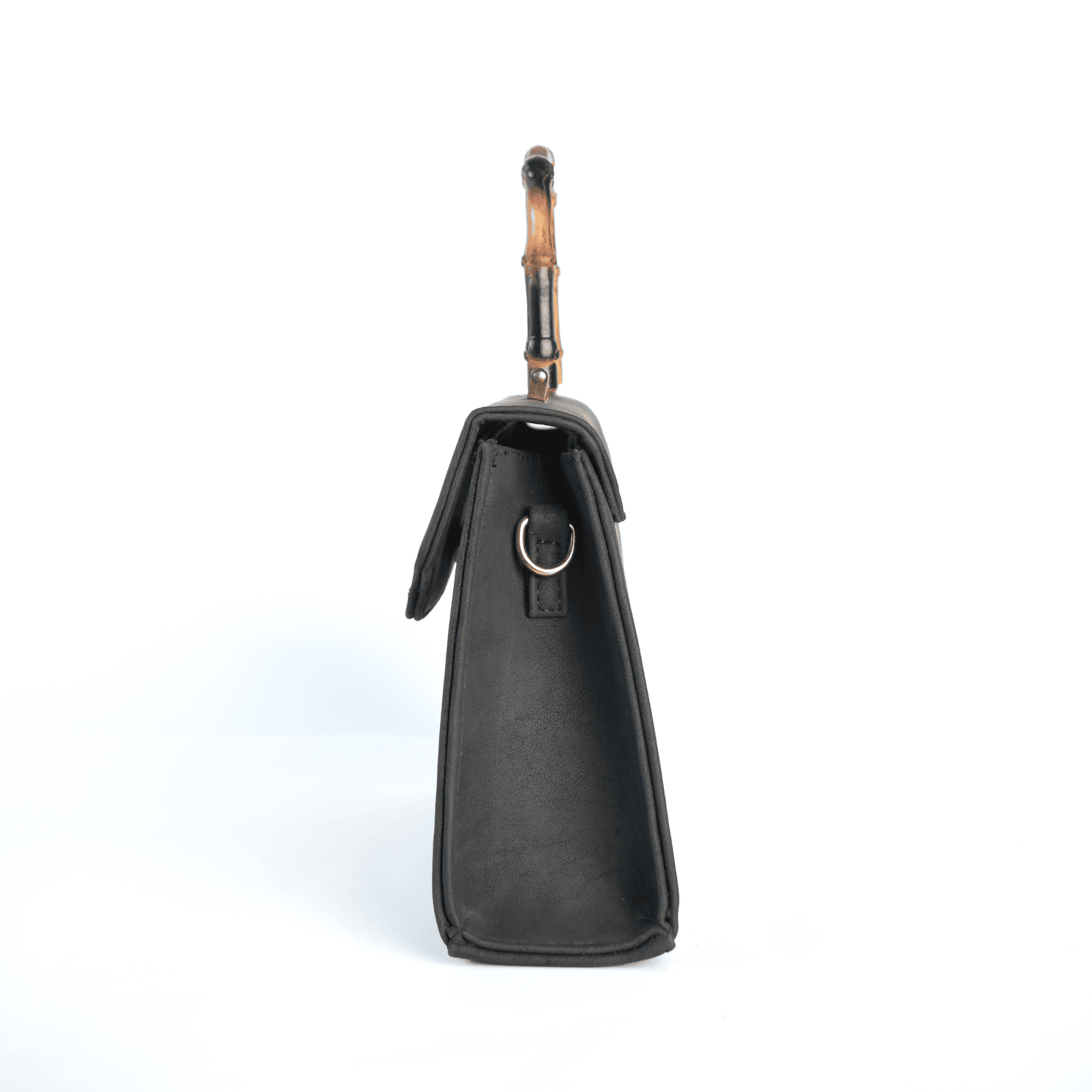 Black Taaq bag side profile showing depth and strap ring